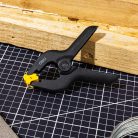 DELI Rugós szorító 100mm DL110004